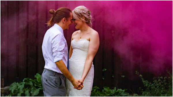 pink smoke bomb wedding photo grace ben curradine barns shrawley