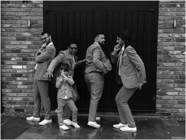 groomsmen fun black and white wedding photo